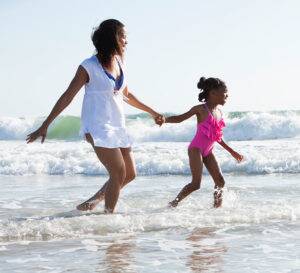 Mother and daughter at beach