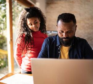 father and daughter working